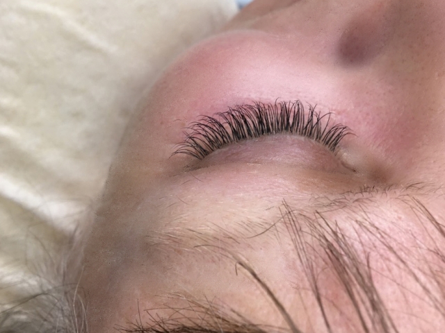 Right eye. Classic extensions. Closed eyelid view.